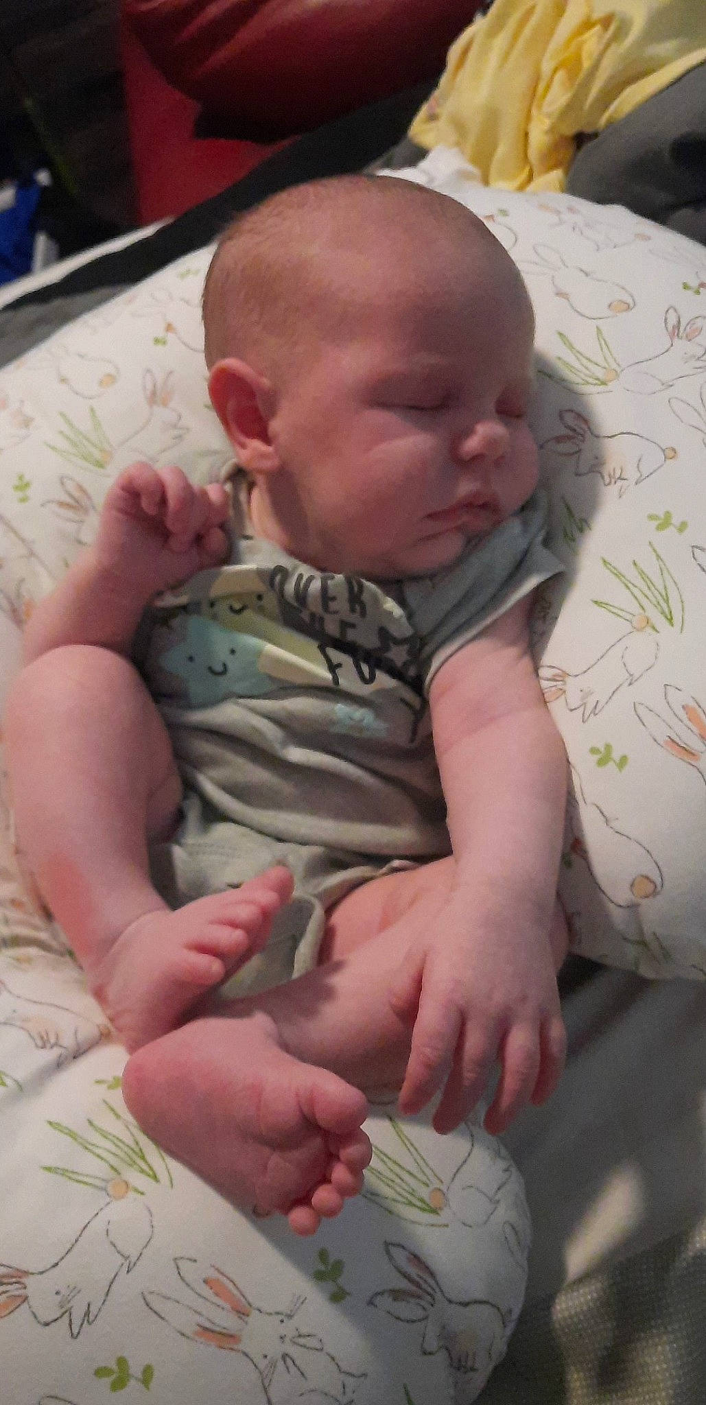 Mckinley is registered to the contest to win money with this photo: baby, baby_products, baby_toddler_clothing, cheek, chest, child, chin, comfort, finger, fun, hand, head, linens, mouth, nose, person, room, sitting, skin, thumb