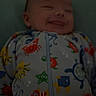 Jaxson joined the competition — help win amazing prizes! baby, smiling, onesie, colorful, sea_creatures, infant, sleepwear, lying_down, face, child, cute, indoor, young, toddler, apparel, patterned_clothing, soft_lighting, portrait, baby_clothes, happy