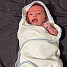 Jaxson joined the competition — help win amazing prizes! baby, newborn, towel, wrapped, infant, cute, face, lying, bed, cloth, blanket, skin, hand, expression, indoors, child, portrait, young, resting, small