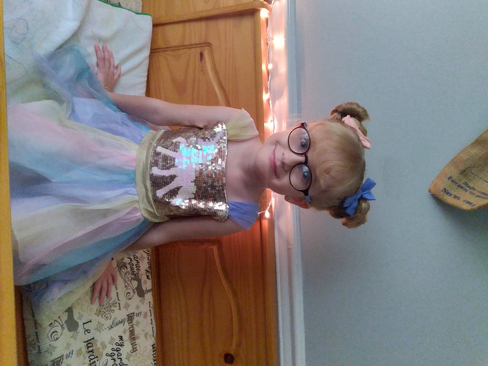 Nevaeh is registered to the contest to win money with this photo: art, ceremony, child, elbow, event, eyewear, fashion_accessory, fun, gesture, happy, jewellery, joy, person, room, smile, tradition, wood, wrist