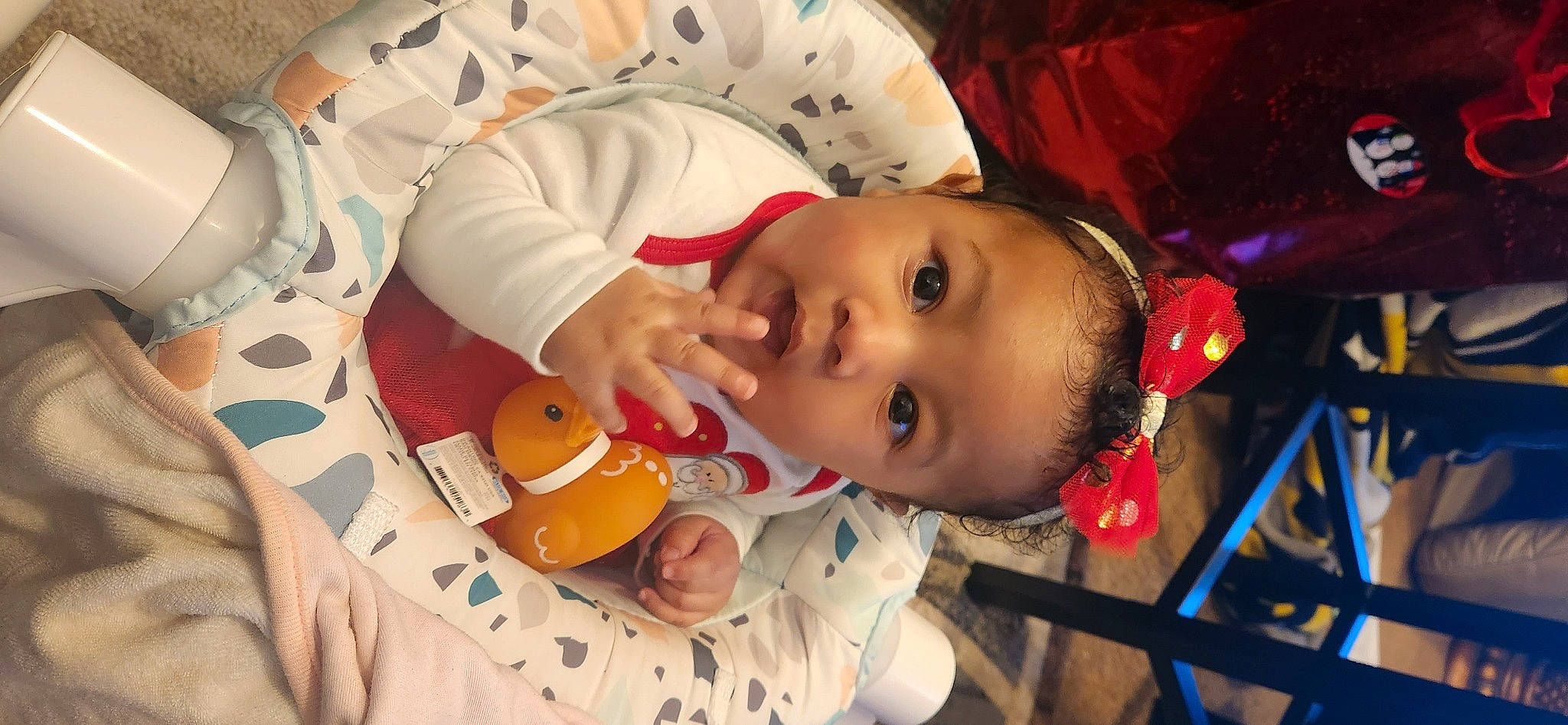 Azaríyah joined the competition — help win amazing prizes! baby, baby_products, baby_toddler_clothing, baby_toys, cheek, child, comfort, event, facial_expression, fun, happy, head, lip, mouth, nose, orange, person, room, skin, toddler