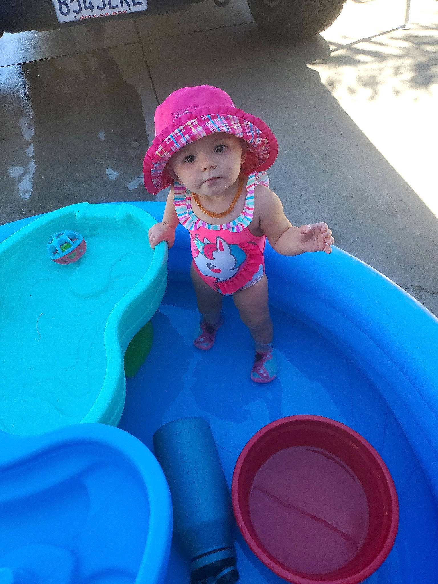 Sayler joined the competition — help win amazing prizes! blue, child, fun, games, headwear, leisure, person, pink, play, product, recreation, smile, summer, sun_hat, toddler, vacation, water
