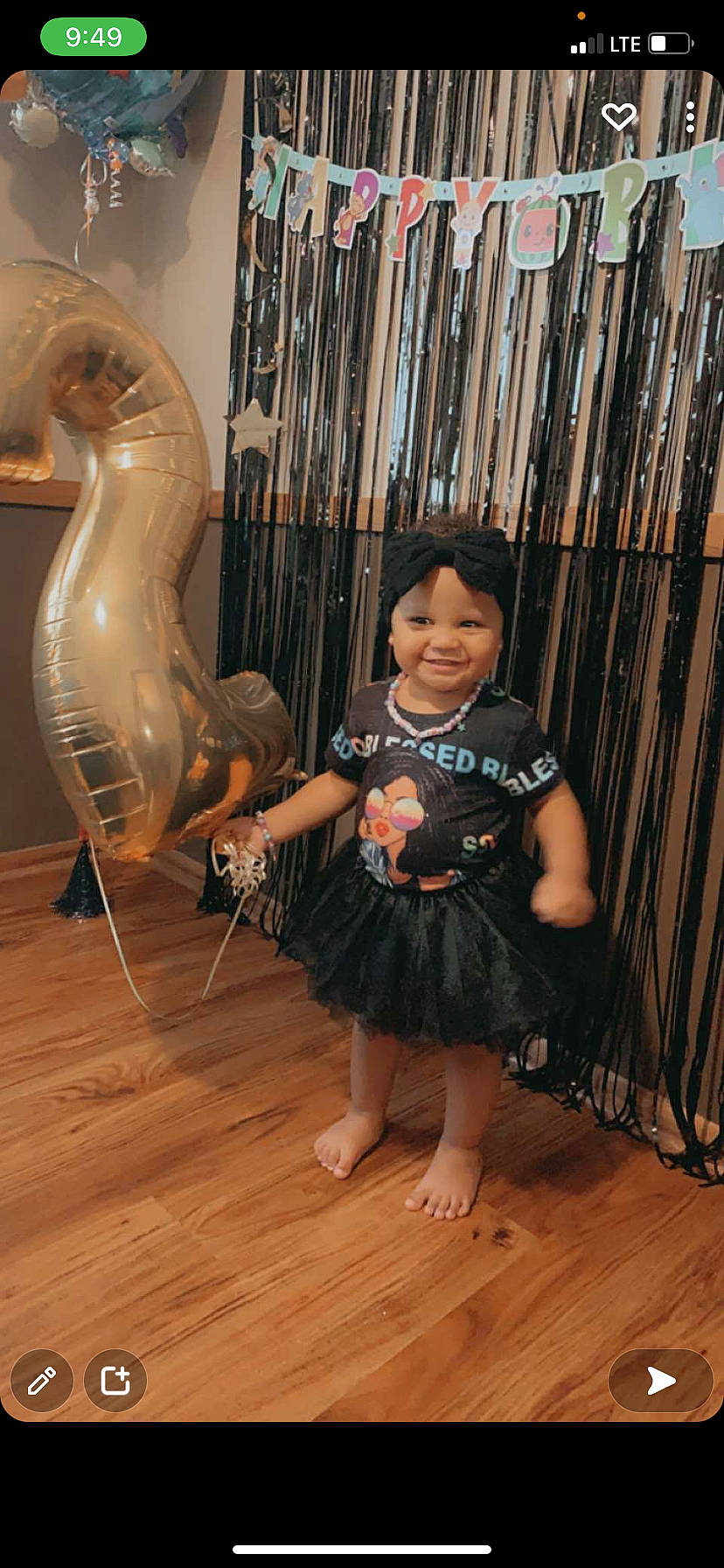 Kennedy is registered to the contest to win money with this photo: art, eye, fence, flooring, foot, fun, hardwood, headwear, joy, laminate_flooring, mammal, metal, organ, person, room, sitting, smile, standing, toddler, varnish