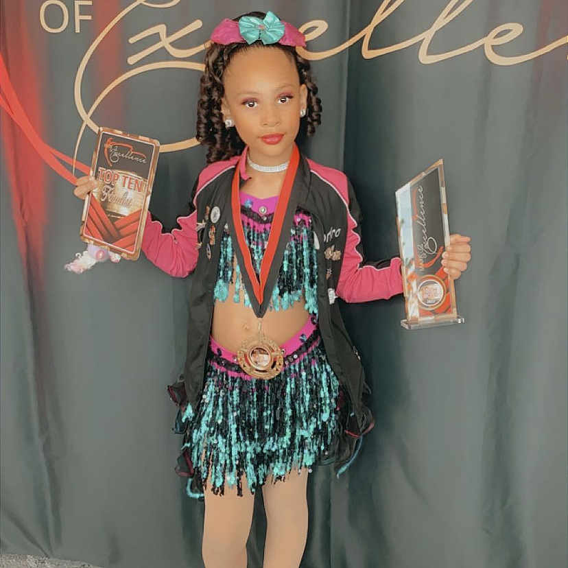 Keondra joined the competition — help win amazing prizes! artist, blackboard, chalk, child, cool, event, fashion_accessory, fashion_design, fun, human_leg, jewellery, magenta, pattern, pink, sandal, t_shirt, textile, thigh, toddler, visual_arts