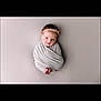 baby, infant, wrapped, blanket, headband, bow, soft, gray, portrait, cute, newborn, child, face, feet, studio, pose, sleepy, adorable, toddler, lying_down