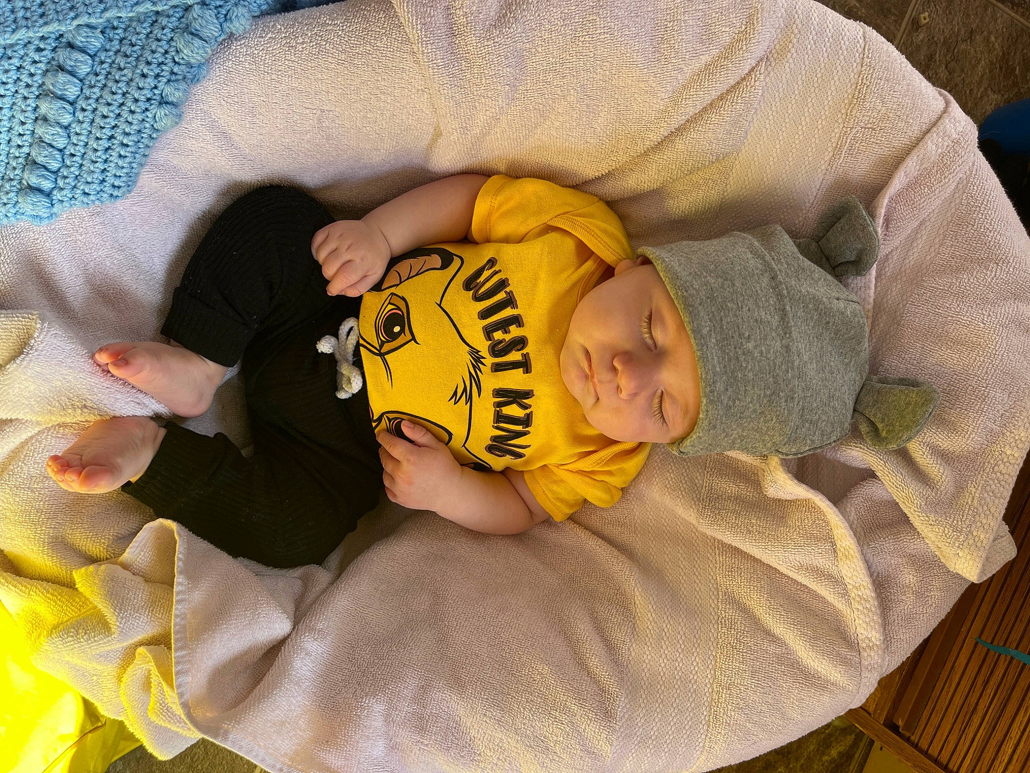 Blake is registered to the contest to win money with this photo: baby, baby_carriage, baby_products, baby_safety, baby_sleeping, baby_toddler_clothing, bedding, bedtime, child, comfort, head, headwear, human_body, infant_bed, lap, linens, nap, person, product, sitting