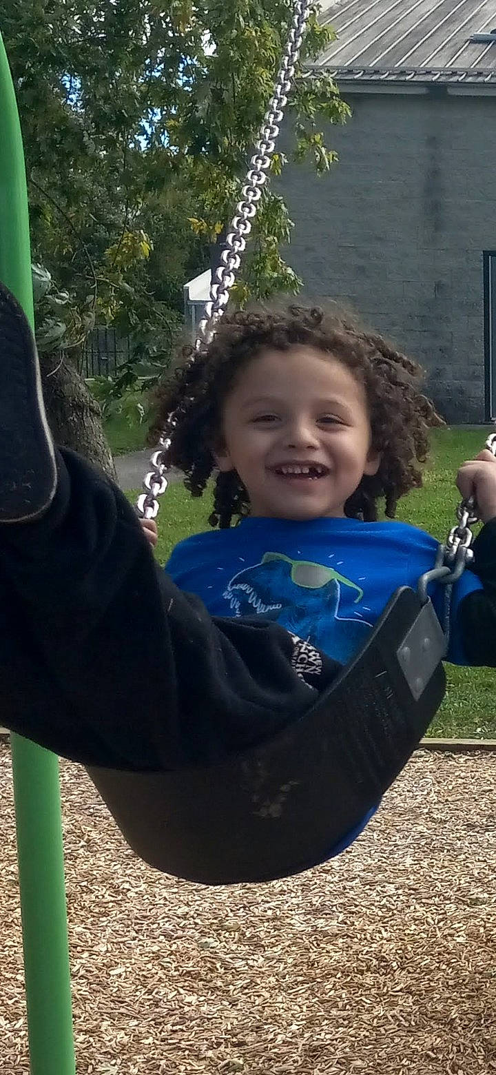 Angel joined the competition — help win amazing prizes! child, city, electric_blue, eye, facial_expression, fun, grass, happy, joy, leaf, leisure, outdoor_play_equipment, people_in_nature, person, plant, playground, recreation, smile, summer, swing