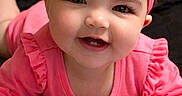 Kinsley is registered to the contest to win money with this photo: adorable, baby, big_eyes, blanket, bow, close_up, cute, hand, happy, headband, indoor, infant, long_eyelashes, lying_down, pink_outfit, portrait, rosy_cheeks, smiling, tooth, toy