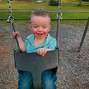 Landyn Scott joined the competition — help win amazing prizes! child, toddler, swing, playground, smiling, happy, outdoor, park, grass, trees, jeans, sneakers, daylight, metal_chains, seat, nature, person, casual_clothing, fun, play