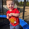 Landyn Scott joined the competition — help win amazing prizes! backyard, barefoot, child, cute, face, fence, grass, happy, outdoor, play, portrait, red_tshirt, safety_net, shorts, smiling, sunlight, toddler, trampoline, trees, young_child