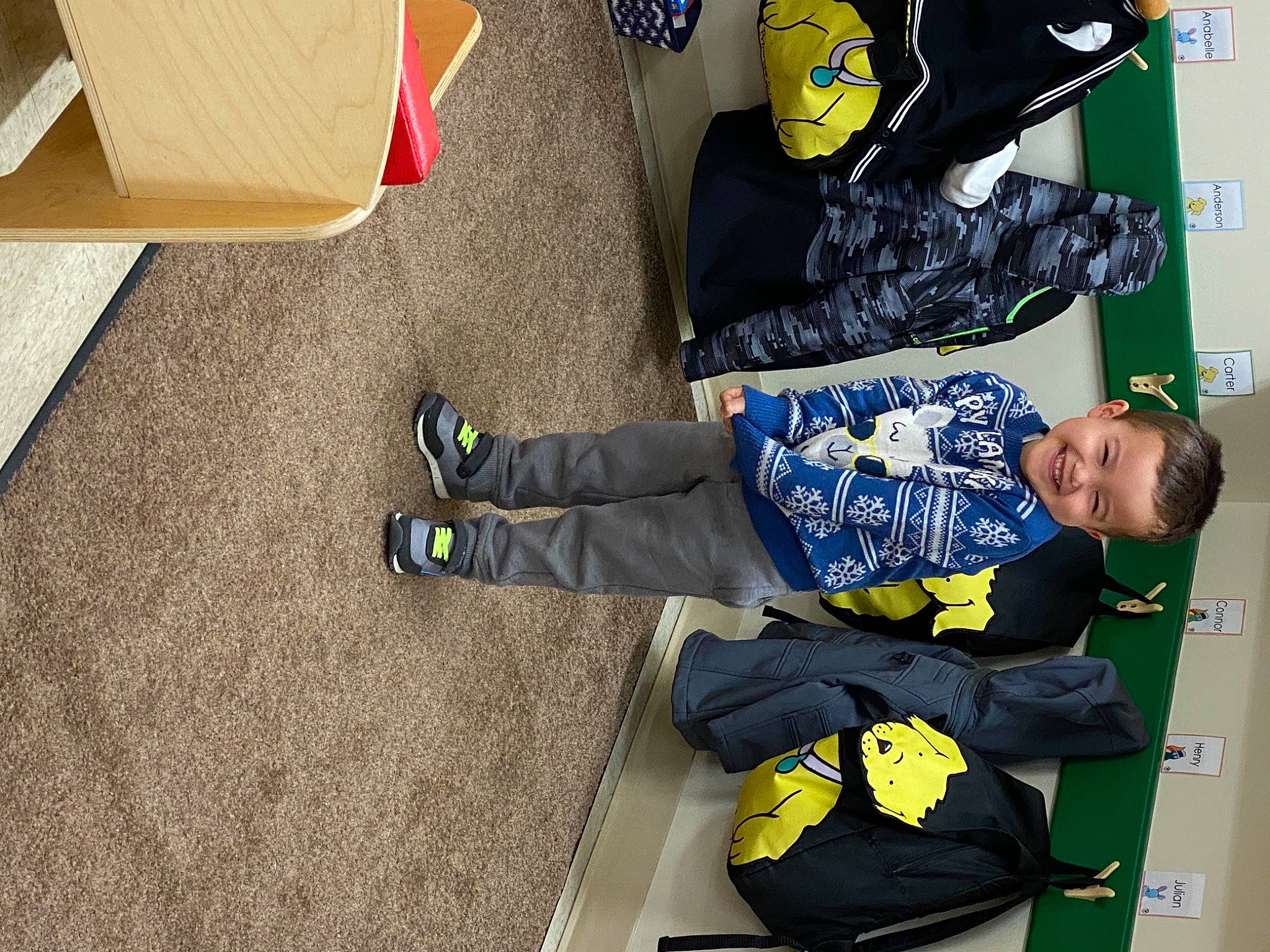 Peter is registered to the contest to win money with this photo: bag, baggage, box, cardboard, glove, joy, outdoor_shoe, person, shipping_box, sock, walking_shoe