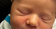 Alaina joined the competition — help win amazing prizes! adorable, baby, blanket, bow, child, closeup, cozy, cute, face, headband, indoors, infant, newborn, peaceful, portrait, resting, skin, sleeping, soft, wrapped