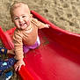 casual_wear, child, closeup, clothing, daylight, feet, friends, fun, happy, holding_hands, outdoor, person, play, playground, red_slide, short_hair, slide, smiling, toddler, toy