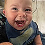 Liam joined the competition — help win amazing prizes! baby, babylaughing, bed, bodypart, clothing, face, finger, furniture, hand, happy, head, laughing, mouth, pants, person, photography, portrait, sitting, smile, teeth