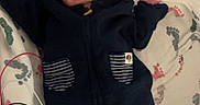 Mateo joined the competition — help win amazing prizes! baby, infant, hospital, medical_tube, nasal_tube, blanket, footprint_pattern, clothing, hoodie, pants, bed, red_light, medical_device, person, lying_down, small_hands, small_feet, cute, indoors, healthcare