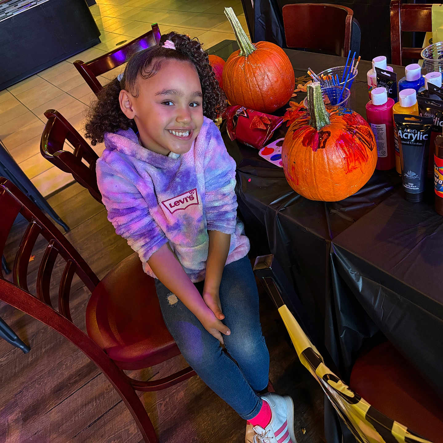 Ryalee is registered to the contest to win money with this photo: accessories, bag, chair, child, face, female, food, furniture, girl, handbag, head, person, photography, plant, portrait, produce, pumpkin, squash, vegetable, wood