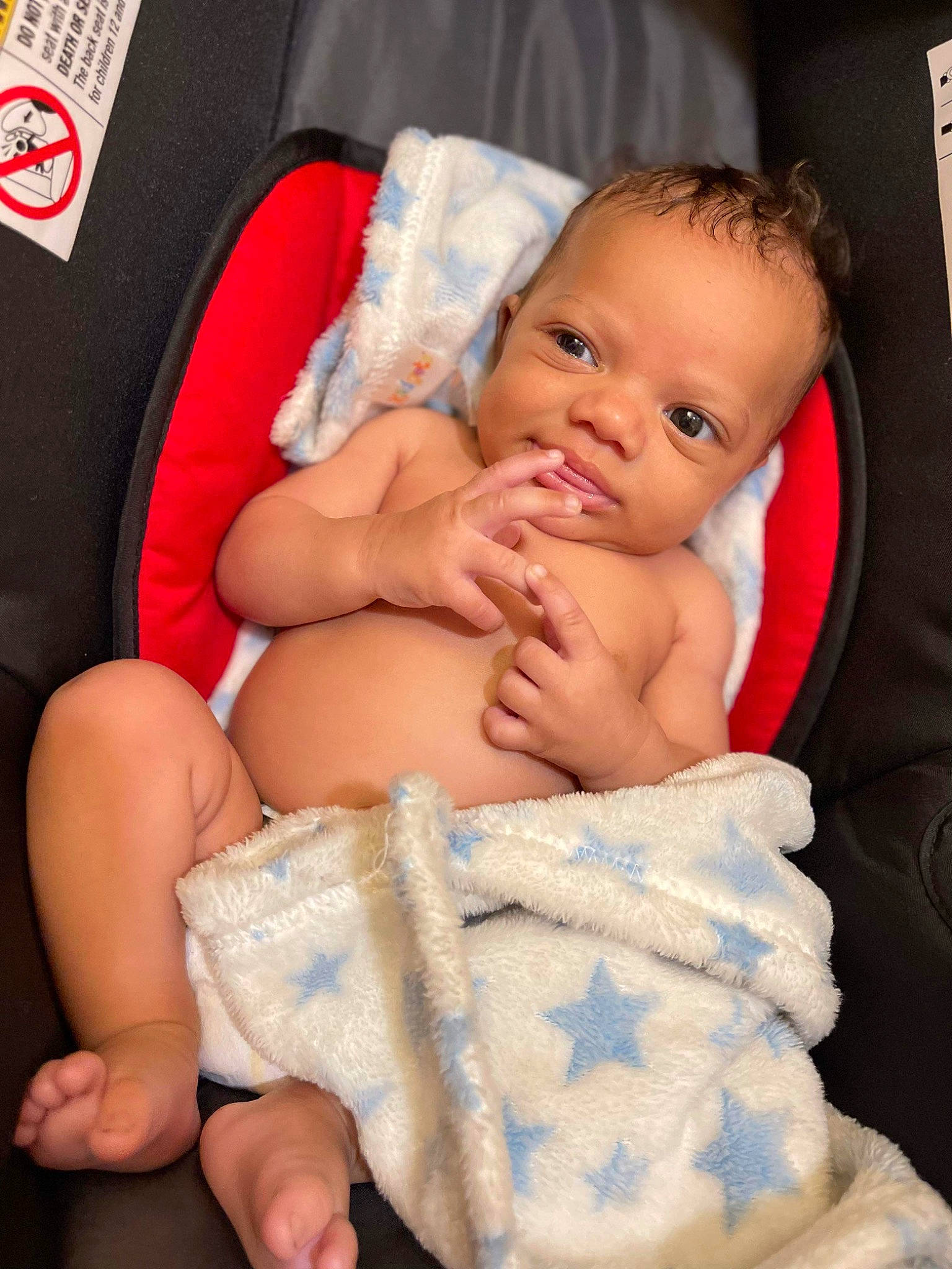 Zyaire is registered to the contest to win money with this photo: arm, baby, baby_toddler_clothing, cheek, chest, comfort, face, finger, gesture, hand, leg, mouth, muscle, person, product, skin, stomach, thigh, thumb, toddler