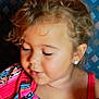 Novalynn is registered to the contest to win money with this photo: child, curly_hair, earrings, colorful_clothing, striped_top, portrait, face, young_child, patterned_background, diamond_pattern, looking_down, close_up, cute, girl, soft_lighting, casual, indoors, skin, cheeks, shoulders
