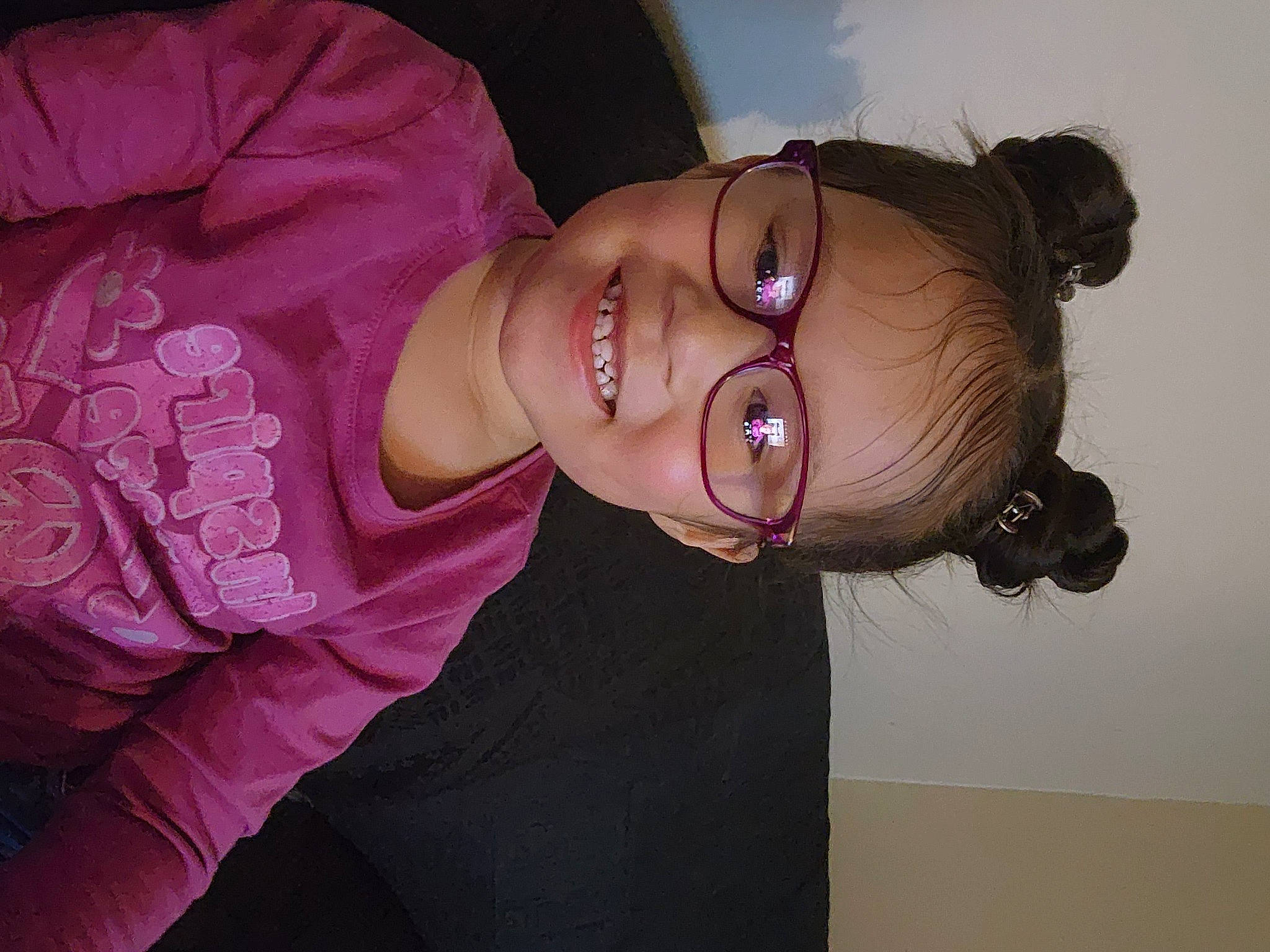 Genesis is registered to the contest to win money with this photo: cheek, chin, cool, ear, eyewear, flash_photography, fun, glasses, happy, jaw, joy, lip, mouth, neck, nose, person, pink, skin, sleeve, smile