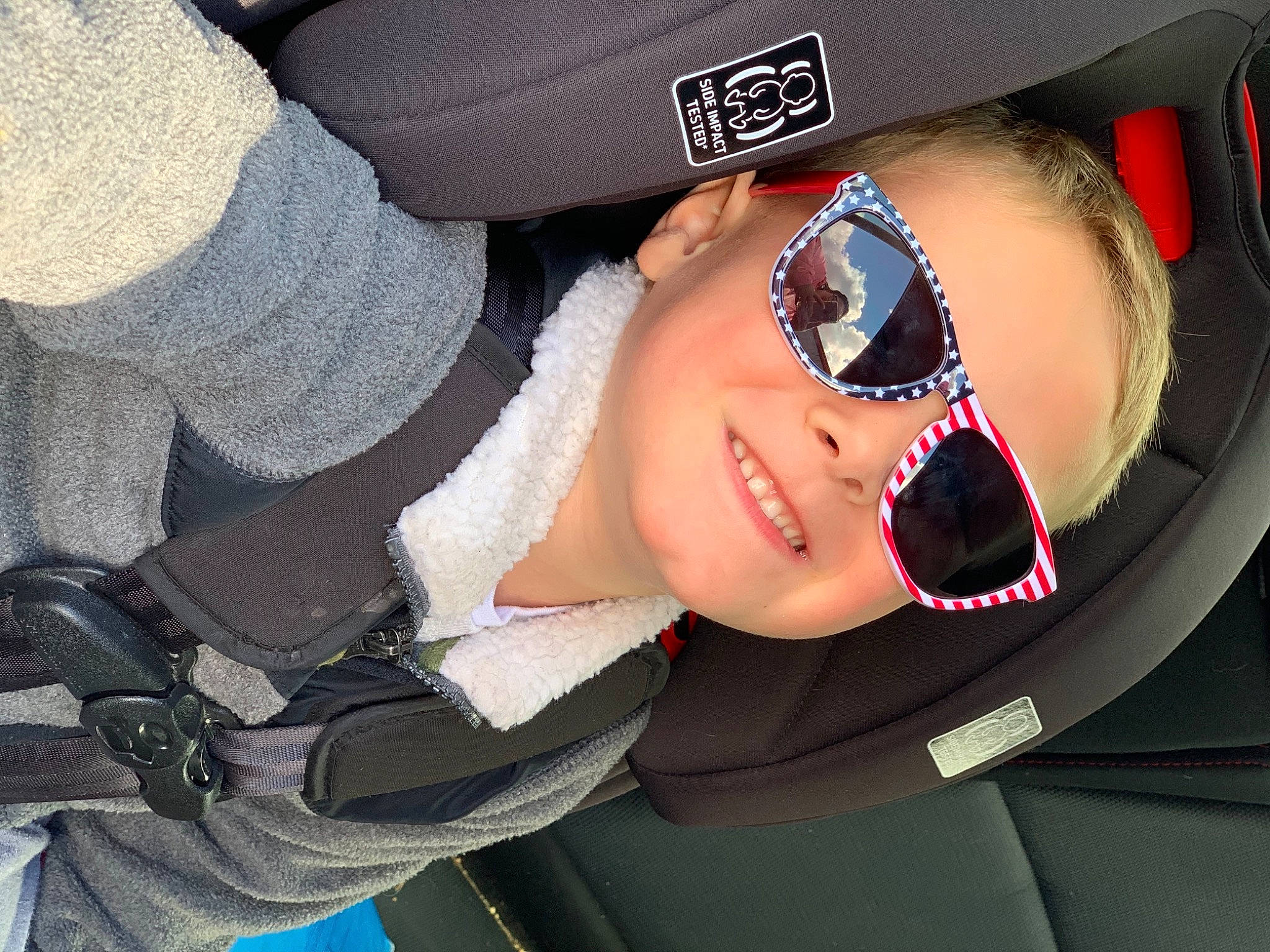 Greysen is registered to the contest to win money with this photo: car_seat, cool, eyewear, glasses, goggles, helmet, joy, person, personal_protective_equipment, sunglasses, vision_care