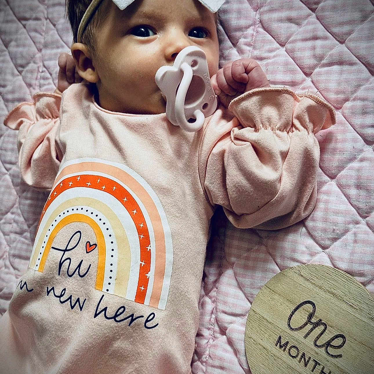 October joined the competition — help win amazing prizes! baby, baby_girl, blanket, bow, clothing, cozy, cute, face, headband, infant, lying_down, milestone, newborn, one_month_marker, pacifier, pink, portrait, quilt, small_hands, soft_lighting