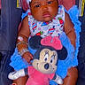 Labariona is registered to the contest to win money with this photo: accessory, baby, blue_dress, bracelet, car_seat, child, clothing, cute, footwear, happy, headband, indoor, infant, minnie_mouse, person, pink_dress, plush_toy, portrait, seat, toy