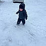 Julian is registered to the contest to win money with this photo: child, toddler, snow, winter, outdoor, coat, hat, mittens, footprints, car, house, cold, play, joy, smile, walking, snowy, background, daylight, nature