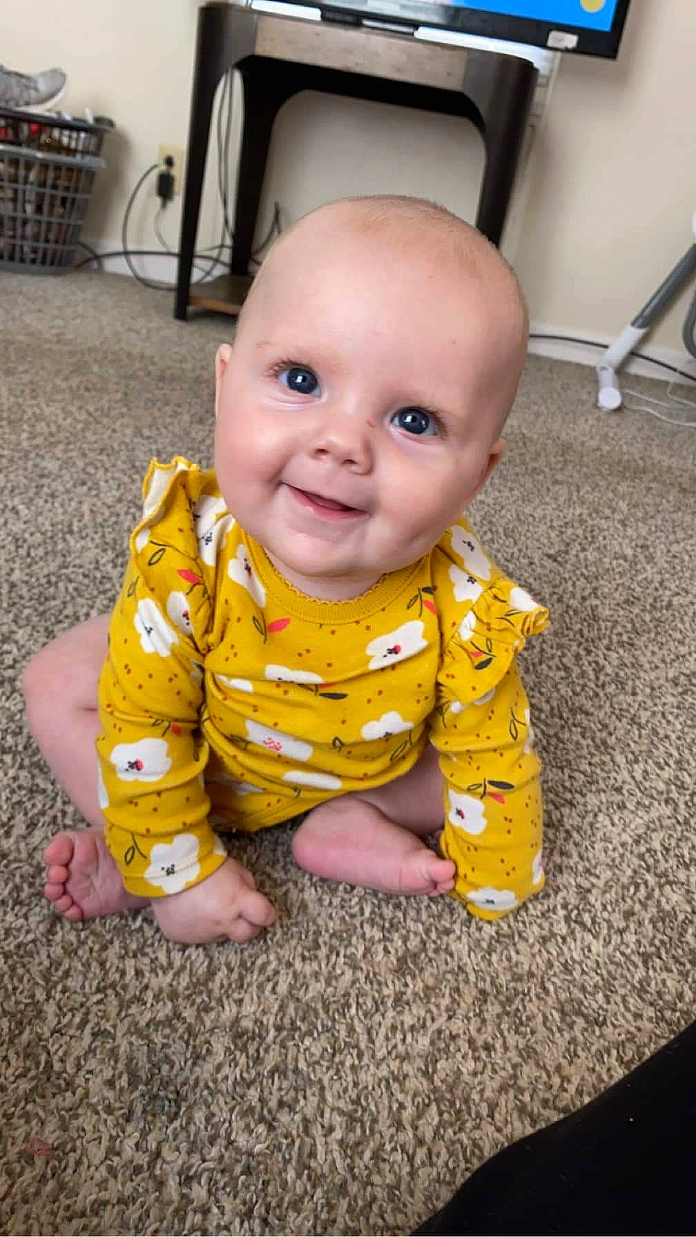 Lylah joined the competition — help win amazing prizes! baby, baby_toddler_clothing, carpet, cheek, child, chin, comfort, finger, floor, flooring, fun, happy, iris, joy, nose, person, sitting, skin, sleeve, smile