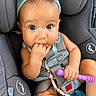Gracia joined the competition — help win amazing prizes! baby, child, car_seat, blue_bow, teething_toy, pacifier, infant, cute, hand, face, eyes, straps, seatbelt, clothing, skin, headband, sitting, grip, indoors, young