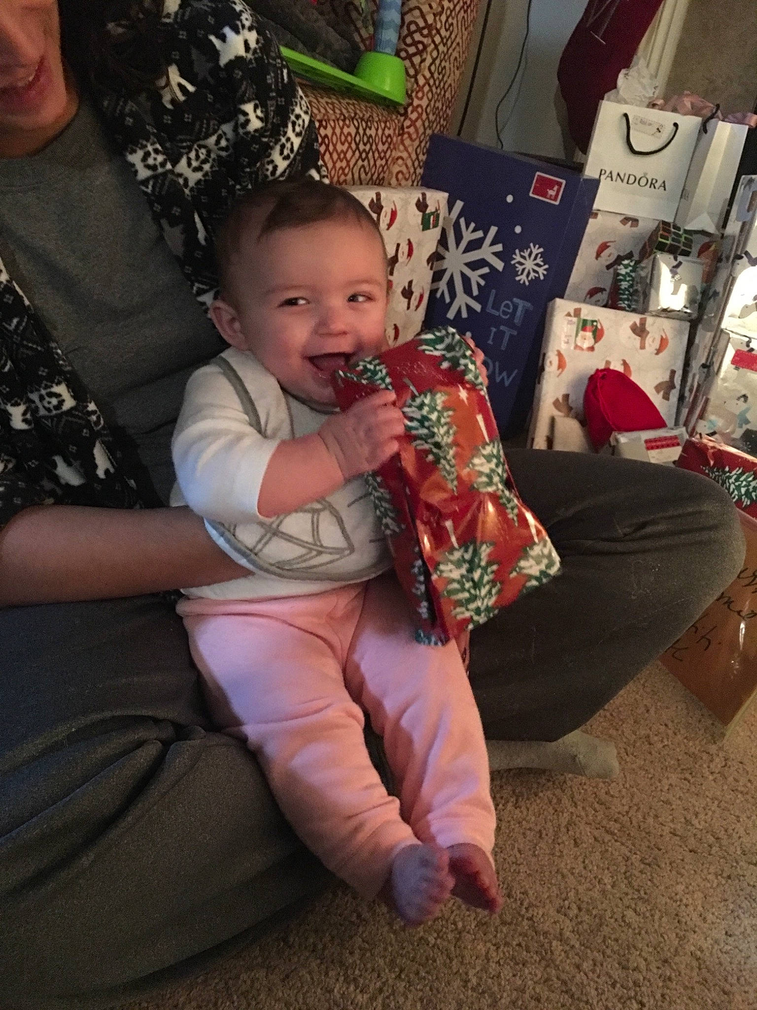 Addison is registered to the contest to win money with this photo: arm, child, day, finger, fun, girl, human_body, infant, leg, person, product, sitting, skin, textile, toddler