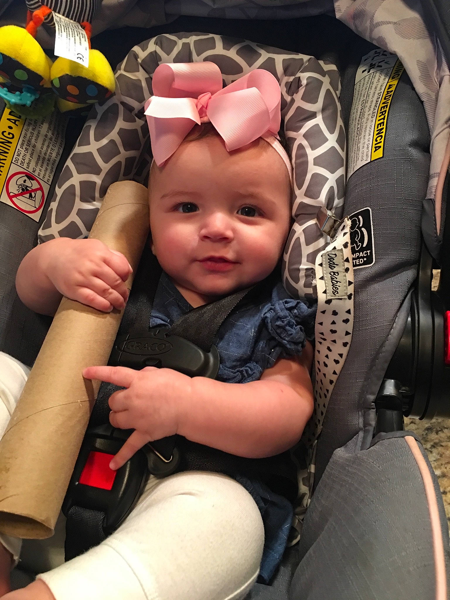 Addison is registered to the contest to win money with this photo: baby_carriage, baby_products, car_seat, child, cool, day, fashion_accessory, fun, girl, headgear, infant, person, product, sitting, skin, toddler