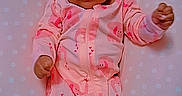 Khalani joined the competition — help win amazing prizes! baby, infant, child, portrait, lying_down, pink_outfit, onesie, headband, cushion, polka_dots, leopard_print, bedding, nursery, indoor, sitting_area, wide_eyes, hands, fashion, date_stamp, photography