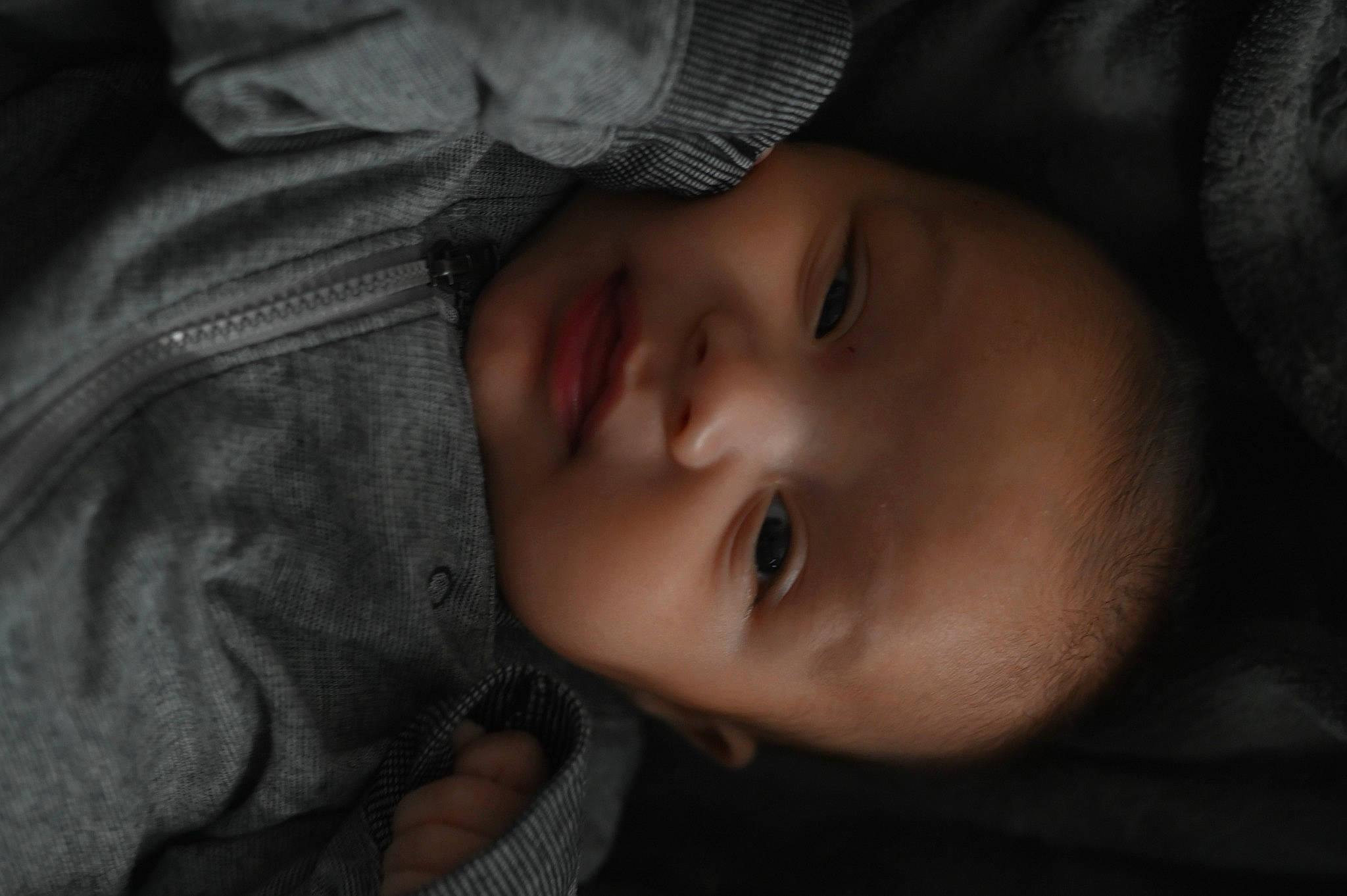 Sheldon joined the competition — help win amazing prizes! baby, baby_toddler_clothing, cheek, child, close_up, comfort, darkness, eyebrow, eyelash, flash_photography, grey, human_body, iris, lip, nose, person, portrait_photography, skin, sleeve, smile