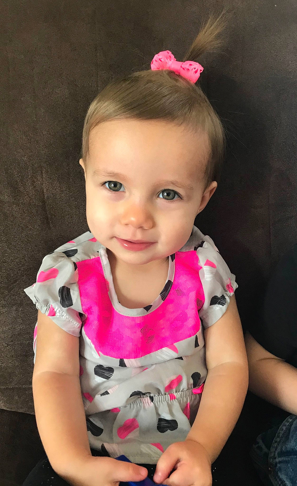 Alaina joined the competition — help win amazing prizes! baby, baby_toddler_clothing, cheek, child, child_model, ear, face, fashion_accessory, hair_accessory, head, iris, lip, person, pink, sitting, skin, toddler