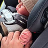 Azraël joined the competition — help win amazing prizes! newborn, baby, infant, sleeping, car_seat, safety_harness, knit_hat, pink, face, hand, adult_hand, gripping, parent, travel, vehicle, portrait, close_up, cozy, peaceful, family