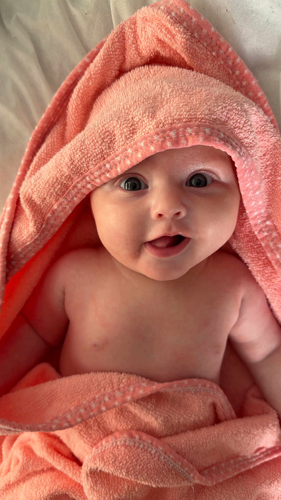 Autumn joined the competition — help win amazing prizes! baby, infant, towel, pink_towel, wrapped, smile, face, eyes, skin, cute, adorable, child, newborn, blanket, soft, portrait, expression, indoors, person, head