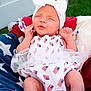 baby, infant, headband, bow, dress, american_flag, blanket, stars, red, white, blue, outdoor, grass, fence, peaceful, cute, portrait, newborn, hands, feet