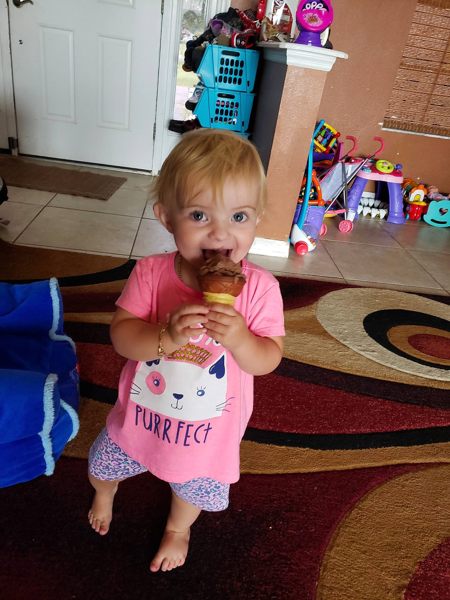 Skylar is registered to the contest to win money with this photo: baby, baby_toddler_clothing, child, floor, flooring, person, pink, play, room, skin, smile, standing, t_shirt, toddler, vacation