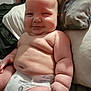 baby, infant, diaper, smile, chubby, skin, pillow, bed, cute, child, cute_face, happy, plump, rolls, person, indoors, resting, flesh, newborn, cuddly