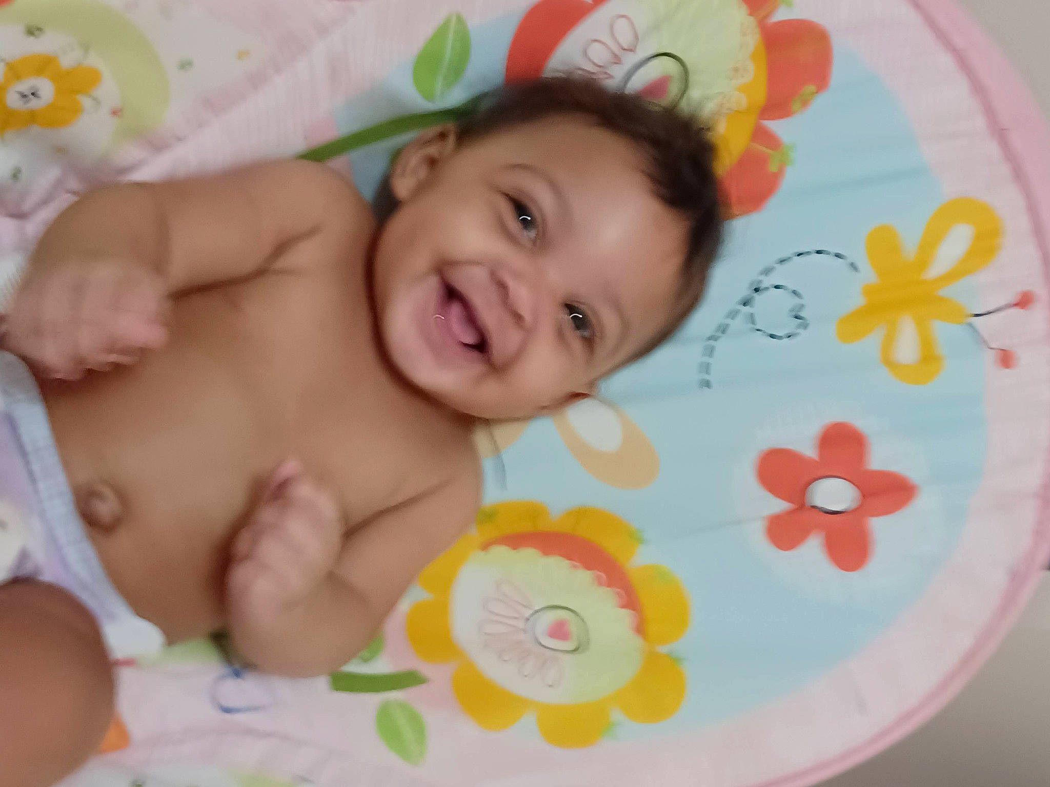 Brooklynn Harris is registered to the contest to win money with this photo: baby, baby_laughing, baby_products, baby_toddler_clothing, beauty, cheek, child, facial_expression, finger, happy, joy, linens, pattern, person, petal, pink, product, skin, smile, sweetness