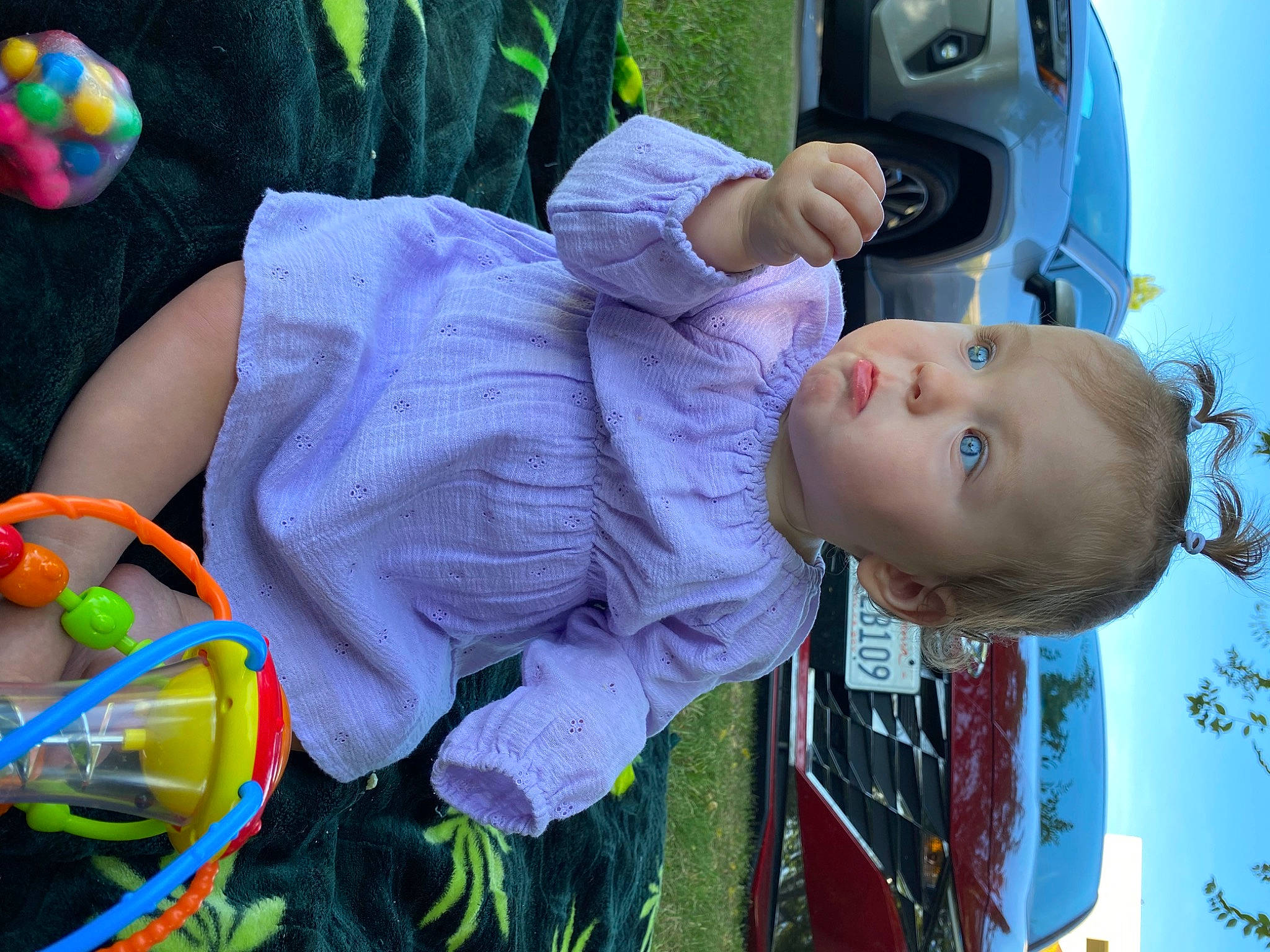 Aliyah is registered to the contest to win money with this photo: baby, baby_products, baby_toddler_clothing, child, facial_expression, fun, grass, green, happy, hat, leisure, people, person, photograph, plant, product, smile, snapshot, toddler, tree