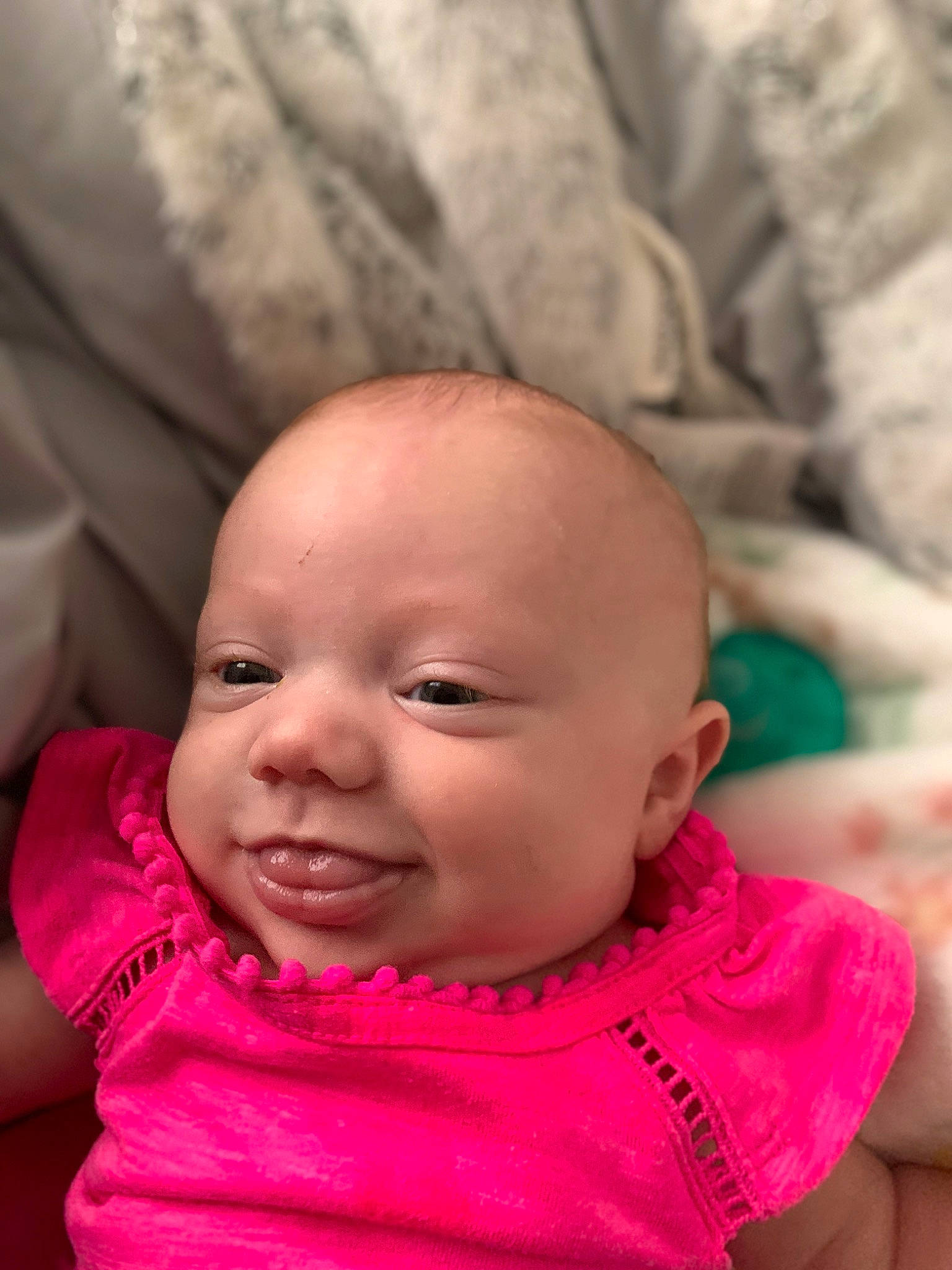 Briella is registered to the contest to win money with this photo: baby, baby_toddler_clothing, cheek, chin, comfort, eye, eyebrow, face, happy, head, lip, mouth, nose, people, person, pink, skin, sleeve, smile, textile