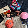 Bjorn Pineda joined the competition — help win amazing prizes! baby, newborn, sleeping, black_clothing, jordan_brand, basketball, pink_basketball, orange_basketball, baby_shoes, sneakers, blanket, soft_texture, artwork, sports_theme, headwear, infant, lying_down, indoor, nike_logo, cute