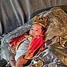 Bjorn Pineda is registered to the contest to win money with this photo: baby, crown, cape, red_cape, gold_embroidery, infant, portrait, costume, fabric, plush, silver_fabric, gray_fabric, cute, indoors, child, newborn, sitting, clothing, face, person