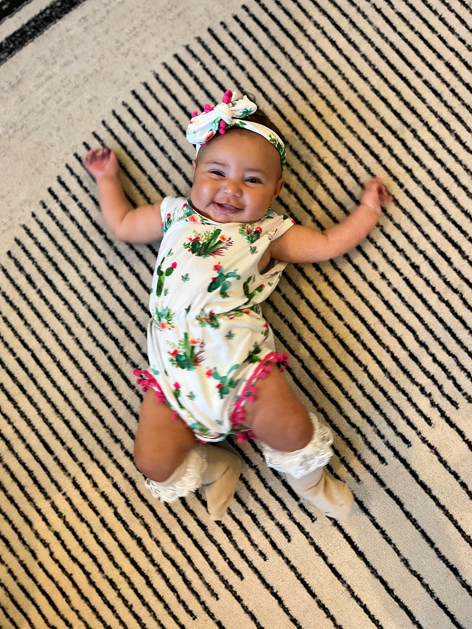 Halo joined the competition — help win amazing prizes! baby, baby_toddler_clothing, barefoot, child, finger, flooring, foot, fun, grass, happy, human_leg, pattern, person, sandal, sitting, skin, smile, thigh, thumb, toddler