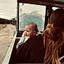 Marley-Rei joined the competition — help win amazing prizes! baby, woman, hair, blanket, vehicle, tractor, road, outdoor, window, metal, person, child, rural, transport, curious, candid, back_view, ponytail, travel, nature