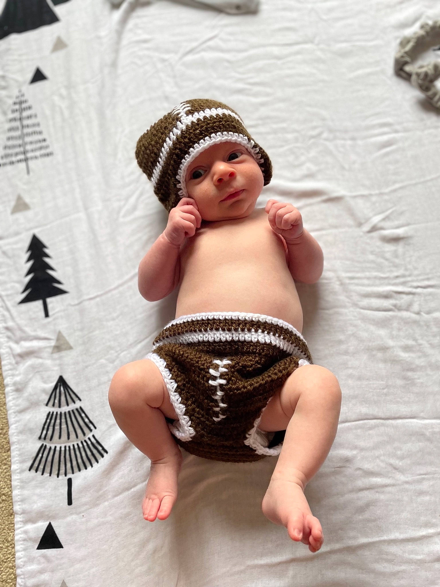Finnegan joined the competition — help win amazing prizes! abdomen, baby, baby_toddler_clothing, cap, child, flash_photography, foot, fun, headgear, headwear, human_leg, jewellery, knee, pattern, person, skin, sun_hat, textile, thigh, toddler
