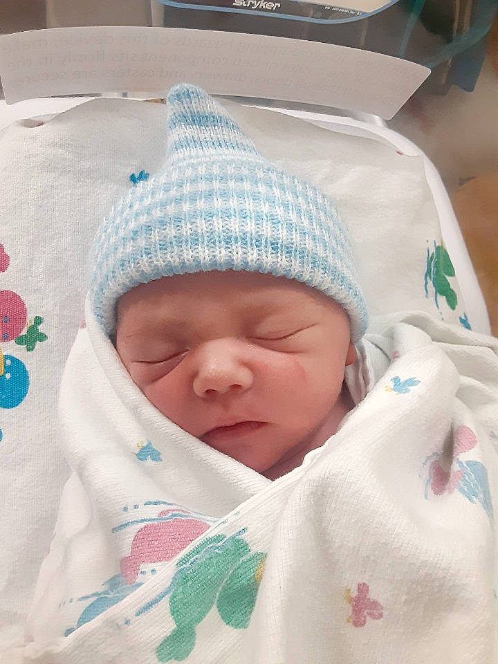 Jensen joined the competition — help win amazing prizes! baby, baby_products, baby_sleeping, baby_toddler_clothing, beanie, bedding, bedtime, cap, cheek, child, comfort, computer_keyboard, hat, headwear, linens, nap, person, room, skin, sleep