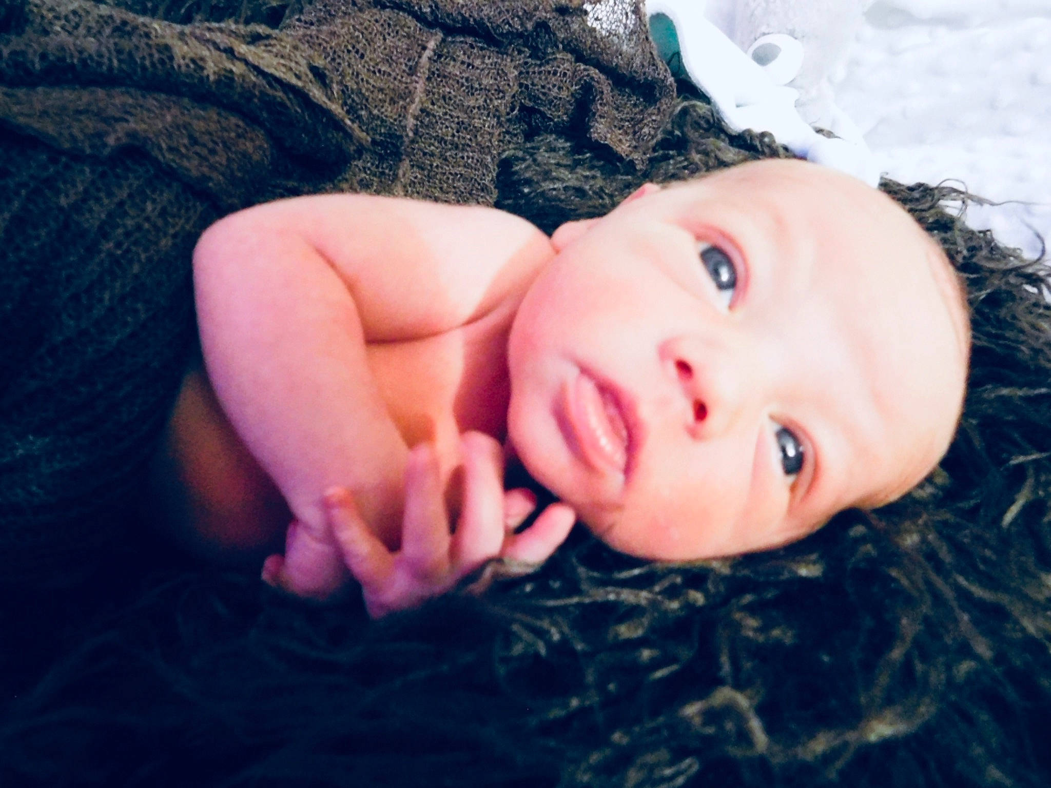 Jensen is registered to the contest to win money with this photo: black_hair, cloud, eyebrow, eyelash, face, flash_photography, gesture, grass, happy, iris, lip, long_hair, mouth, nose, people_in_nature, person, plant, skin, toddler, tree