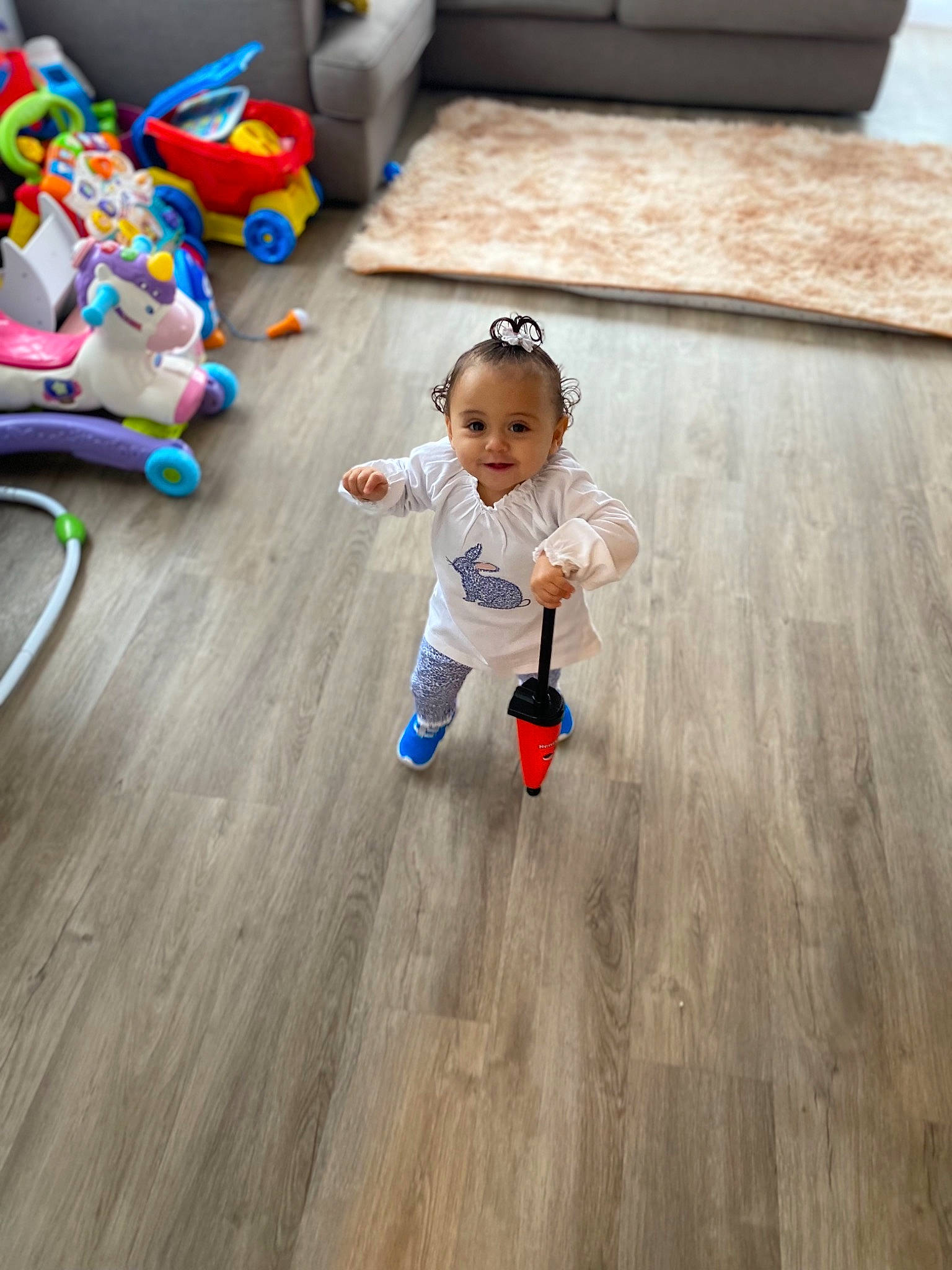 Amina joined the competition — help win amazing prizes! baby, baby_toddler_clothing, baby_toys, child, floor, flooring, fun, happy, hardwood, joy, laminate_flooring, leisure, person, sitting, toddler, toy, varnish, vertebrate, wheel, wood